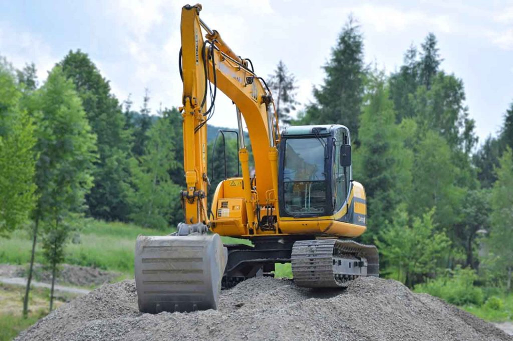 person riding excavator