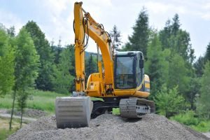 person riding excavator