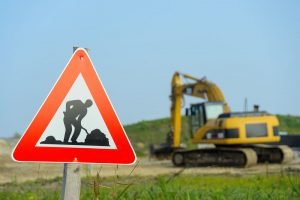 construction site sign with excavator Sioux Falls, SD